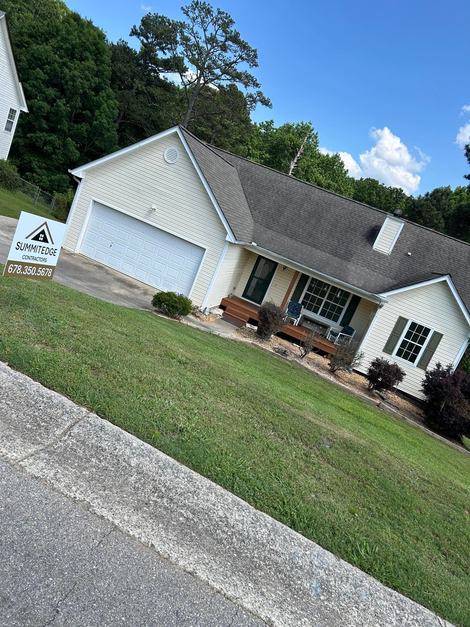 SummitEdge Contractors yard sign at job site